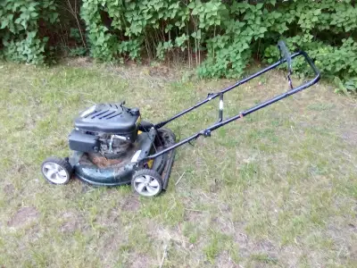 Yardworks brand push mower with Briggs and Stratton gas engine ( no oil mix ) 21 inch cut blade ( NE...