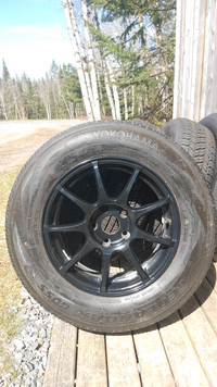 Brand New + another set of used Tires with rims. 215/70R 16