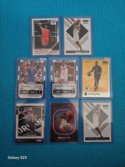 Featured here are various Zion Williamson basketball cards, perfect for any collector! These used ca...