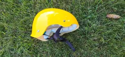 Size M paddling helmet for use with kayak or canoe.