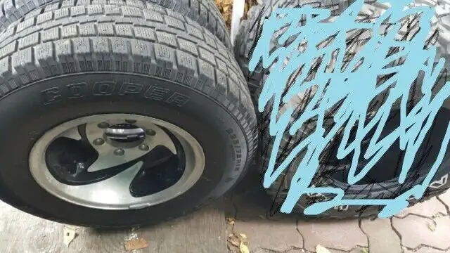 four studded 235 x 75 x r15 on 4  american eagle rims in Tires & Rims in Vernon - Image 2
