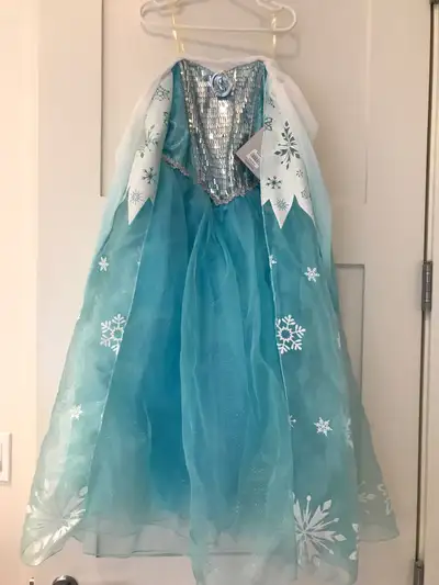 Elsa Costume Purchased at Disney Store. Size 7/8. Brand New With Tags. Never Worn. Smoke Free Home.