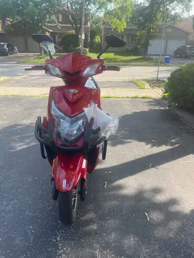 Brand new e-bike Key Features: - Stylish shiny red and black body with aggressive angular design - L...