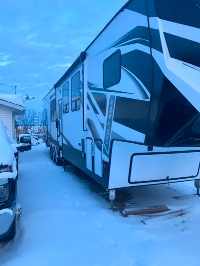 For sale is a 2021 voltage 4271. Camper was bought new in April of 2022 from western Rv. 46 foot lon...