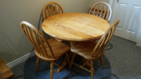 Pedestal table with four matching chairs