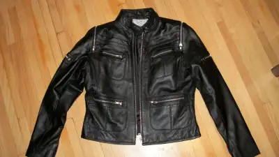 ** New black Vance Leather Collection jacket with eleven zippers, 7 pockets, fully lined, soft leath...