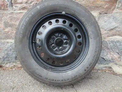 I have a FULLSIZE spare tire that will fit most Nissan Rogue S or SV models. It has a brand new rim,...