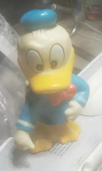 Vintage Walt Disney Productions Donald Duck Plastic Coin Bank (1970s/1980s)Bring a piece of classic...