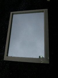 $20.mirror taupe color. dusty but in perfect condition 22"x28"