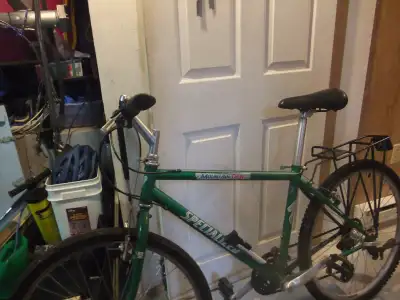 Specialized bike, 26 inch street tires , 18 speed, frame 17/12 inch ,pump included, quick release on...