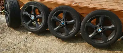 Used 5 spoke 5x120 Black BMW OEM wheels rims on 205/50/17 all season tires. The wheels have no curb...