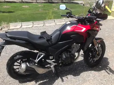 Like new. Low kms. Dealer installed handle protectors, accessory plug and centre kick stand.
