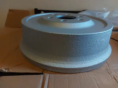Bought brand new brakes for my vehicle, then got into accident, now selling. Brand new rear brake dr...