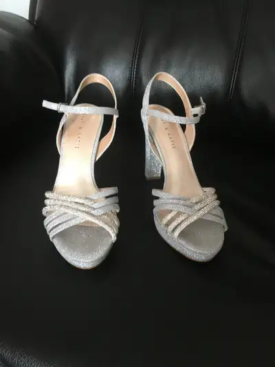 Beautiful sandals worn once to wedding. Paid $75 asking $45. Great for wedding or vacation.