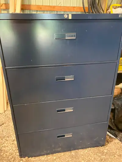 Selling 2 used 4 drawer lateral filing cabinets... BLUE in color, View more