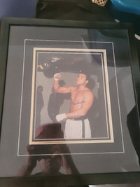 MUHAMMAD ALI SIGNED AND FRAMED 8 X 10...AUTHENTIC WITH COA!!