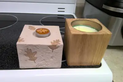 Unused candles with ceramic & wood holders.$3 each/2 for $5, View more