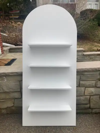 Made out of wood, 32 inches wide x 72 inches high. Built to be self standing. Custom built. Used onc...