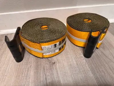 Get ready to secure your load with these two heavy-duty tie-down straps, each boasting a working loa...