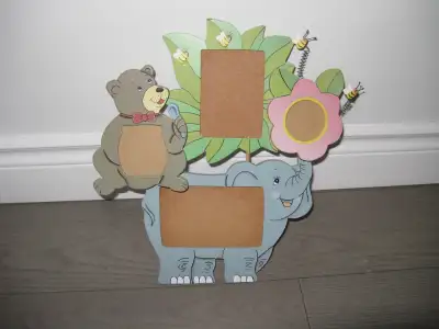 Hanging or standing, and holds up to 4 pictures: 4"x6", 3.5"x5", 3"x3", 2.5"x2.5" Frame size: 14.5"...