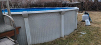Free 27' swimming pool with pump and filter.