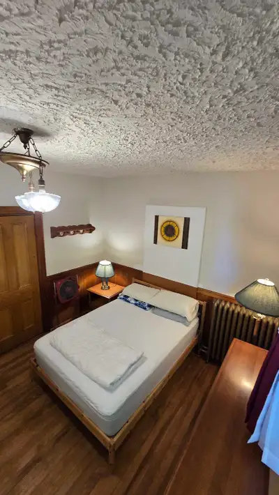 This charming one-bedroom apartment offers a cozy living space complete with all essential furniture...