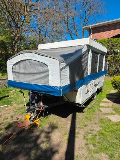 • 2013 PALOMINO TENT TRAILER, 12 feet long, 7 feet wide and 4 feet high when it is close, 19 feet lo...