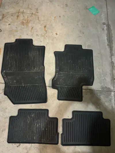 These are Nissan Qashqui all weather floor mats, designed to protect your vehicle's interior from di...