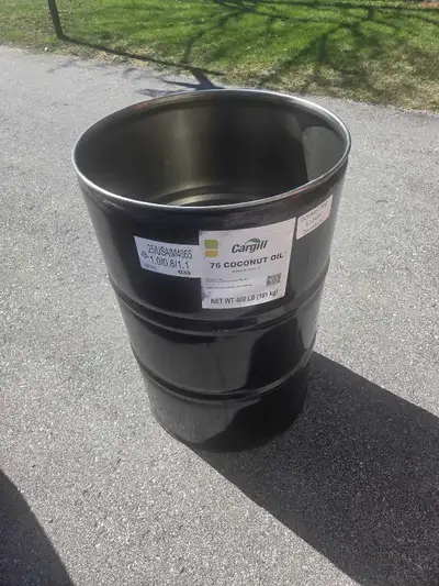 Steel drum for storage of liquid, international shipping, barque stand making, making an outdoor ove...
