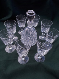 Vintage Pinwheel Crystal decanter and 8 sherry wine glasses