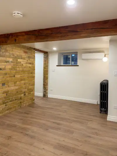 Newly completed, never-before-occupied 1,100 sq ft basement apartment with a private entrance, locat...