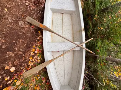 10’ fibreglass rowboat in good condition. Oars included. Will handle a small outboard motor. $750 OB...
