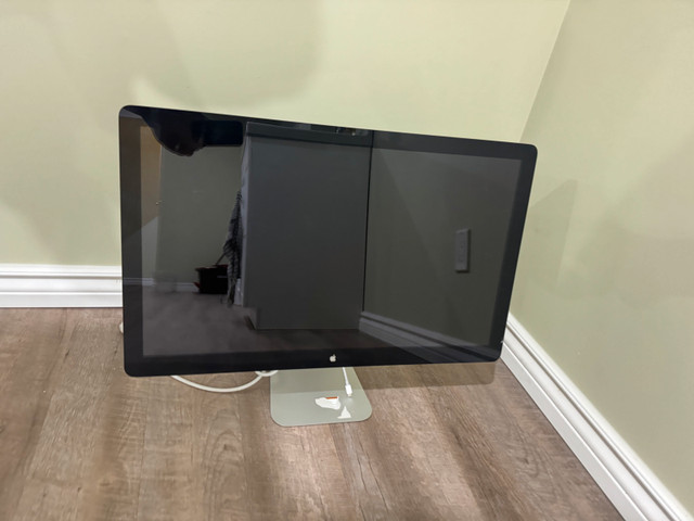 Apple monitor a1407 with thunderbolt adapter  in Monitors in Oshawa / Durham Region