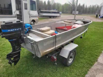 14' Princecraft fishing boat. 20Hp Mercury motor and trailer. Boat had new floors and seats installe...