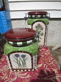 Two ceramic canisters, locking lids, Botanical design.