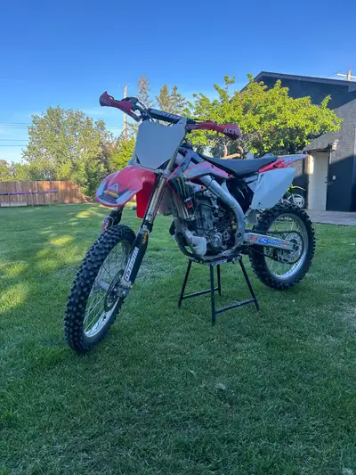 2005 CRF450R. Bike runs perfectly. Bark buster guards. Full DR.D exhaust system. Valves adjusted and...