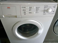 24”    apartment size AEG  front load washer 100% working