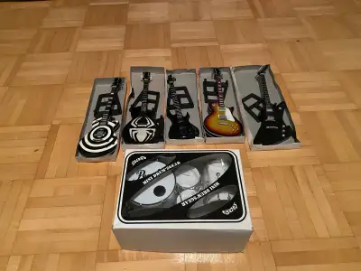Mini guitars and drum set, View more