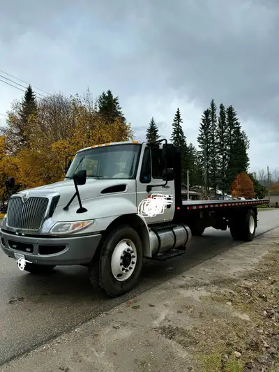 Automatic transmission 2013 international flatdeck dura star diesel.Deck is brand new 24 ft long wit...