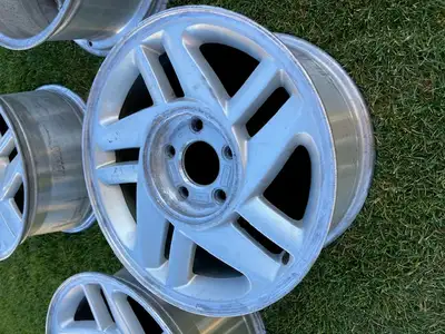 * Set of 4, Camaro 16" OE wheels. Flanges and bead seats in excellant condition. Located in South Ed...