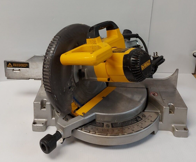 DeWalt DW703 Mitre Saw Details: • Brand: DEWALT • Type: Miter Saw • Power Source: Corded Electric •...