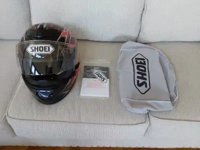 Shoei helmet, size XS. Used 4 times only. Like new, very clean,