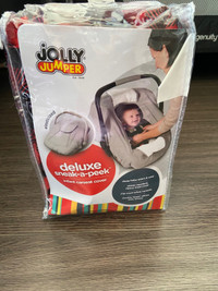 car seat cover winter ( new in bag) 