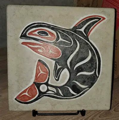 This is a handpainted concrete stepping stone. I was made in B.C. It is finished with an outdoor sea...