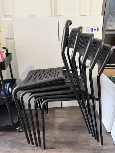5 Black plastic IKEA chairs. Pick up only.