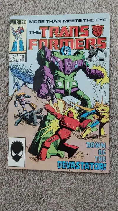Mid grade TRANSFORMERS #10. 1985 Marvel Comics. 1st App Devastator and Constructicons. Please see ph...