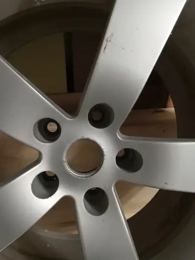 (4) 2016 Nissan Pathfinder Alloy Rims with Michelin snow tires. 5x4.5" - 5x114.3mm bolt pattern rims...