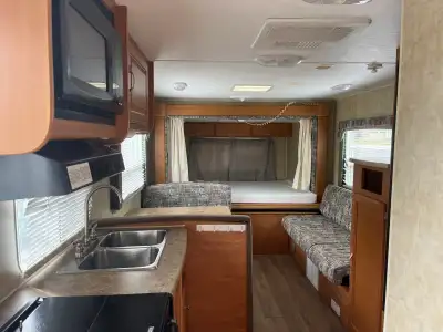 2008 Travel Trailer. 18’ trailer with 4’ slide out the back. Sleeps 6-8. Everything works, good cond...