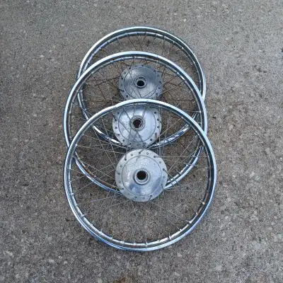 Honda C50, C70, C90. 17" x 1.20" front wheel, one wheel has slight ding on rim. $60.00 each