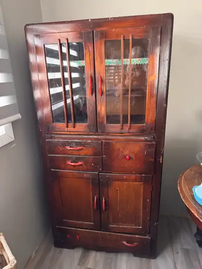 This vintage/antique china cabinet is a unique find, perfect for adding character to any home. It's...
